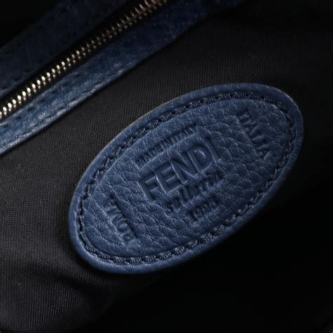 fendi zip around blue metal